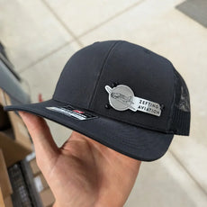 Custom Company Badge Hats With Logo - Mesh Trucker Hat – Brushed Silver/Black Badge - Economy - Headgear Hats
