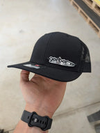 Custom Company Badge Hats With Logo - Mesh Trucker Hat – Brushed Silver/Black Badge - Economy - Headgear Hats