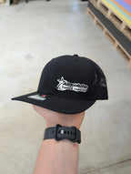 Custom Company Badge Hats With Logo - Mesh Trucker Hat – Brushed Silver/Black Badge - Economy - Headgear Hats